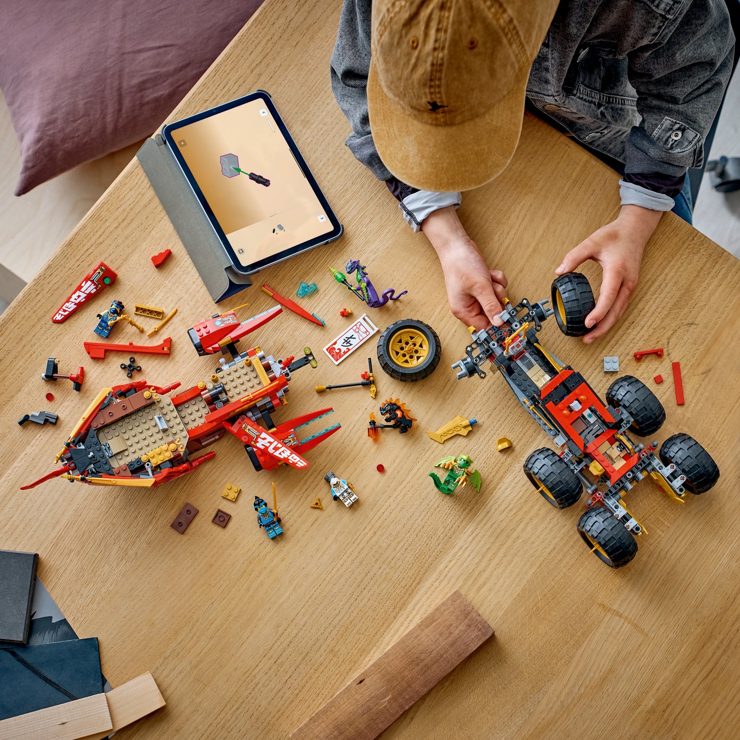LEGO NINJAGO Land-Bounty - Bouwpakket voor Kinderen Vanaf 9 Jaar met 3 Voertuigen en 6 Minifiguren - Incl. Speelgoed Motor, Terreinbuggy en Schip - Cadeau voor Jongens en Meisjes - 71869